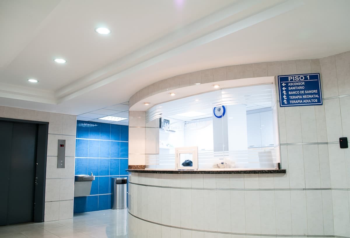 Medical reception desk handling patient calls and appointments