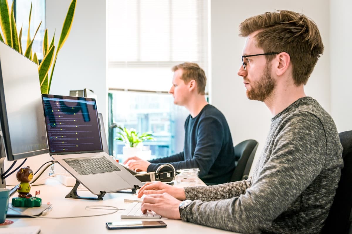 Team mapping an outsourcing workflow before launch