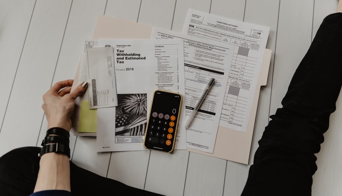 Accounting documents and calculator for bookkeeping support